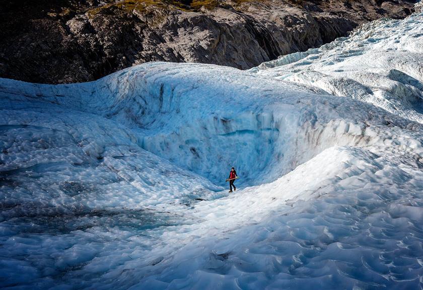 Person trekking through ice