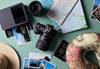 Flatlay of travel items taken using Canon EOS R6 Mark II