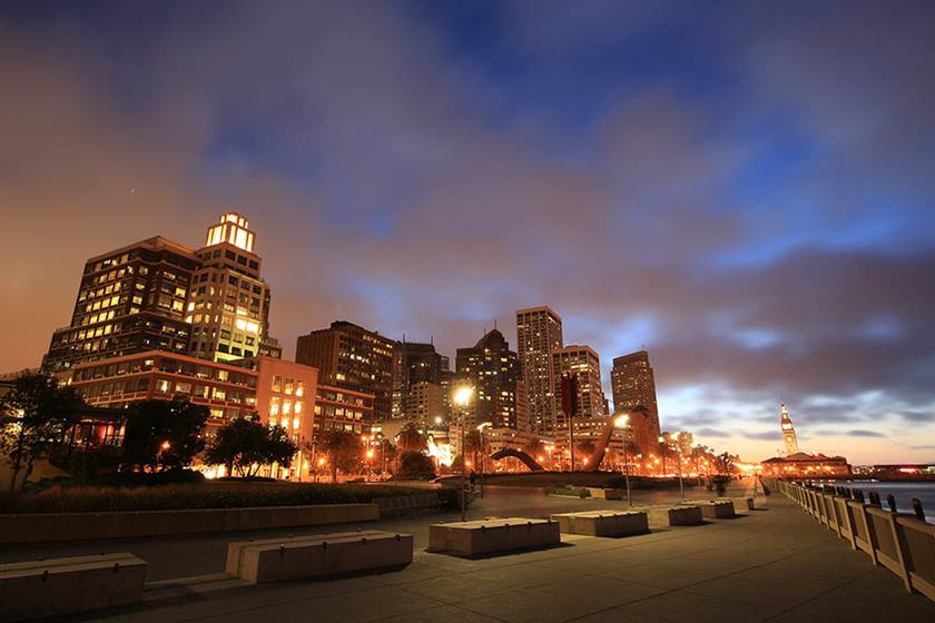 Image of a city illuminated at dusk taken with the Canon EF 11-24mm f4L USM wide zoom lens