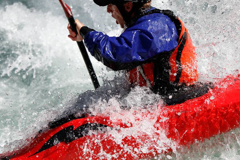 Man kayaking in water