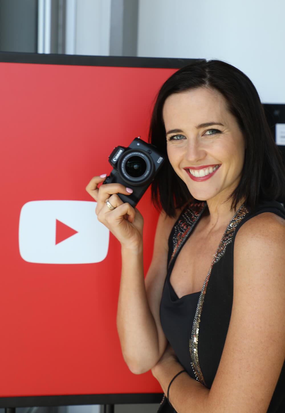 Photo of Vlogger Shae-Lee Shackleford with a Canon EOS M50