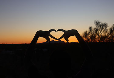 Image of heart hands silhouette