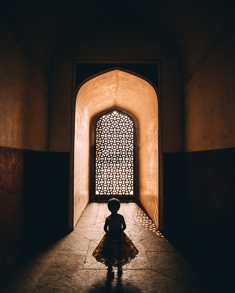Image of girl in doorway. Shot by Melissa Findley.