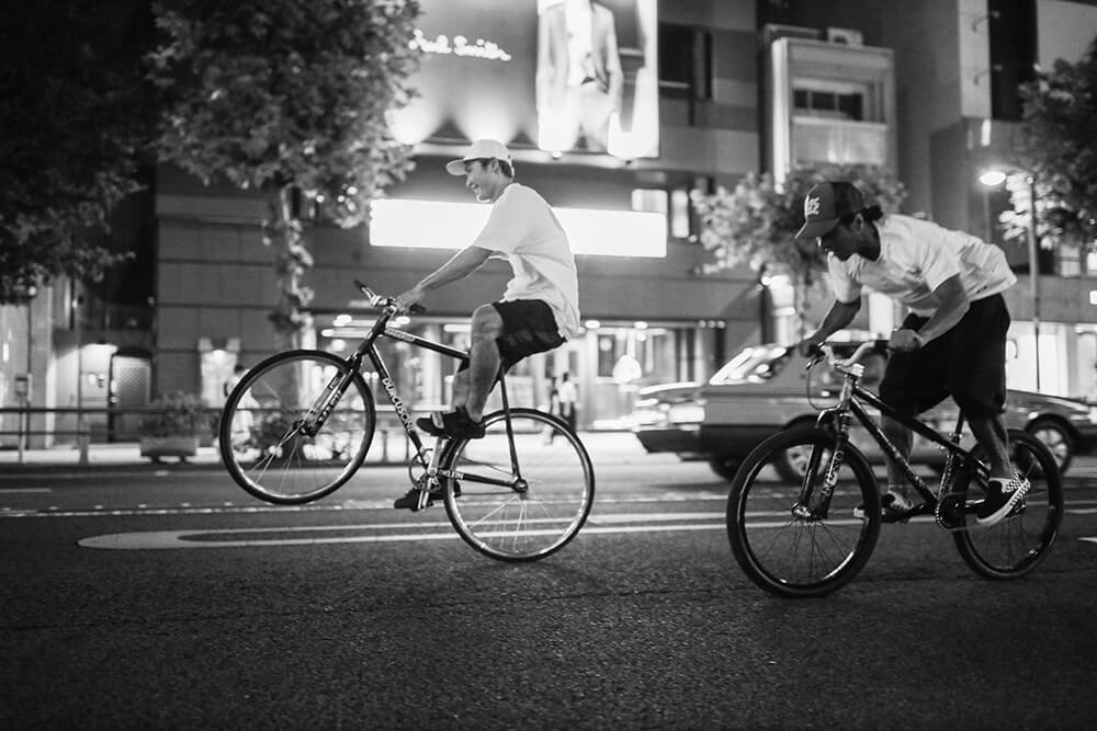 Black and white Image of cyclist taken with the EOS R, by Maria Boyadgis