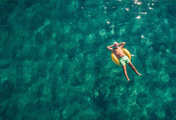 Man relaxing in pool