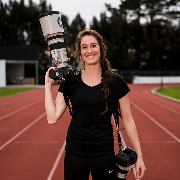 Image of Alisha Lovrich holding Canon gear