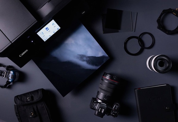Flatlay of Canon camera gear and printer taken using Canon EOS R5