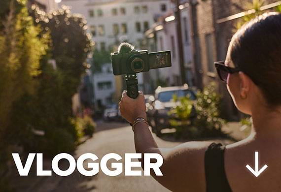 Image of a vlogger using a PowerShot camera out in the streets