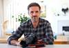 Image of Canon Master Mark Horsburgh holding a Canon EOS camera