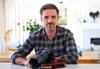 Image of Canon Master Mark Horsburgh holding a Canon EOS camera