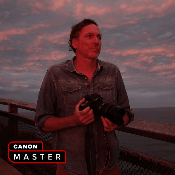 Image of Canon Master Paul Blackmore holding a Canon EOS camera