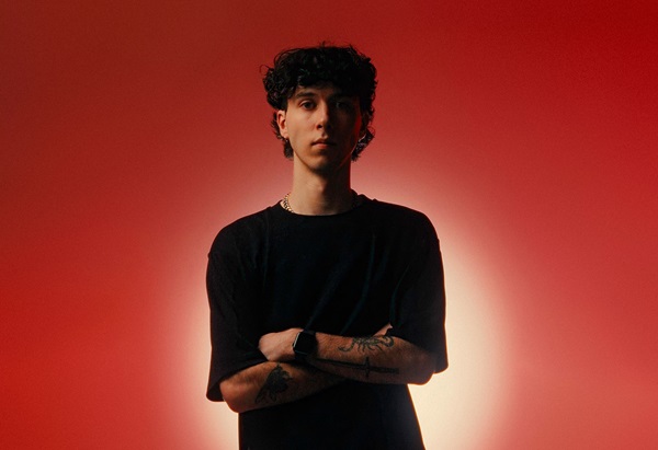 Image of The Circle mentor Brendan Cecich in a studio with red background