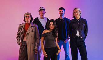 Group image of The Circle mentors on a studio with pink and purple background