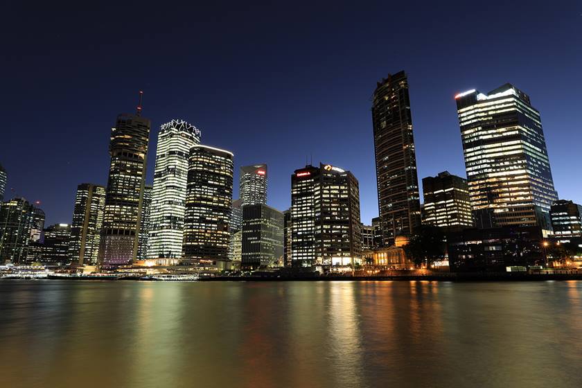 City reflections in the water at night