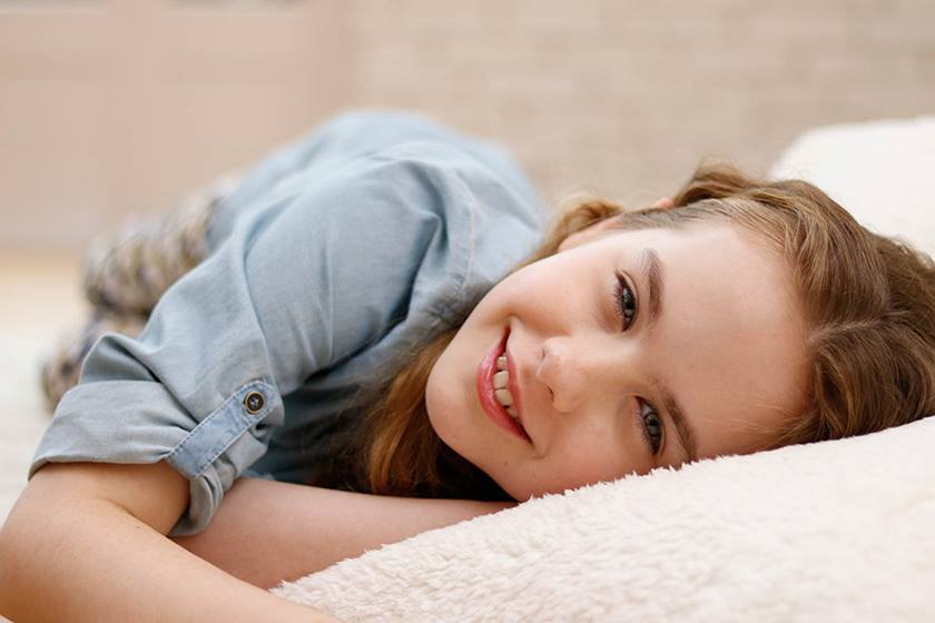 Child laying down taken using EF 50mm f/1.8 STM