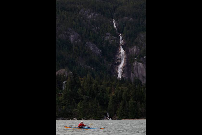 Man kayaking in water
