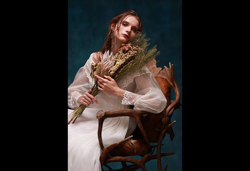 Portrait image of model with flowers taken with EOS 1D X Mark III