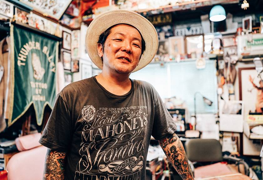 Portrait of a tattoo artist in his shop. Image shot with the EOS R