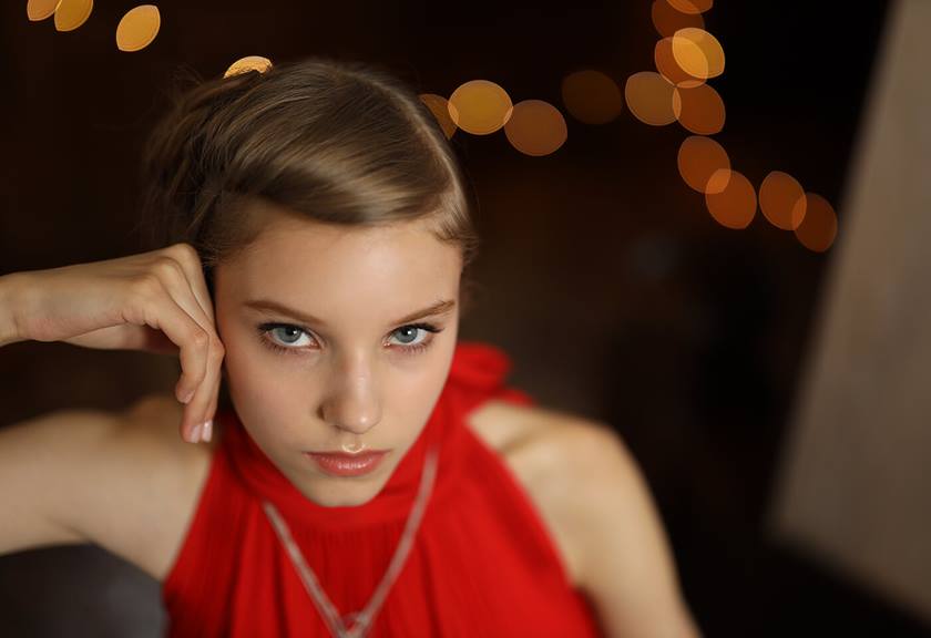 Photograph of model in red dress taken using RF 50mm f/1.2 L USM