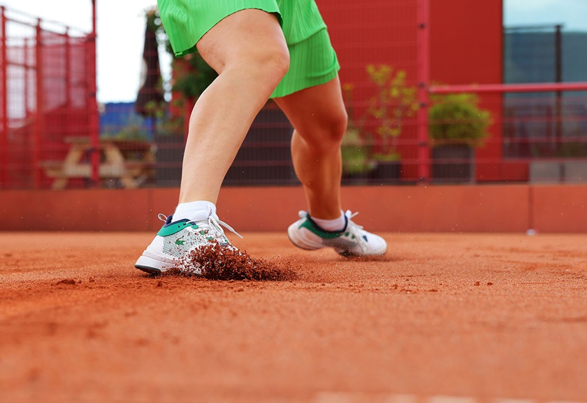 Close up image of a tennisn player's legs in action