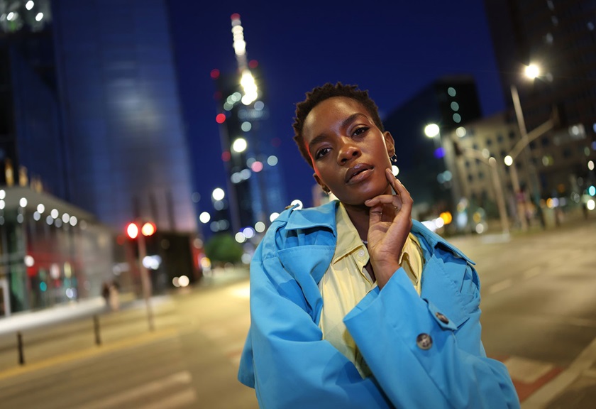 Image of a woman in night life captured with RF 24mm f/1.4L VCM lens