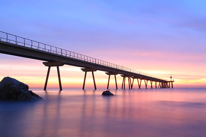 Photo of a bridge at sunset from a low angle shot on PowerShot G7X Mark II