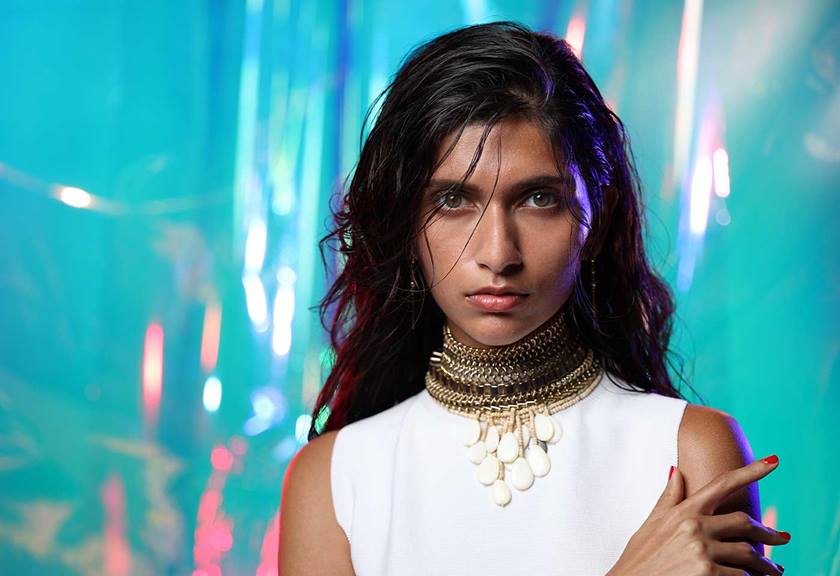 Image of model with turquoise background taken using EOS R3 with RF 24-105mm f/2.8L IS USM Z 