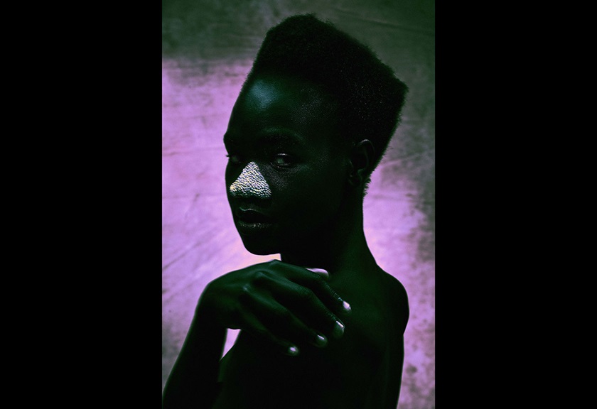 Creative fashion photography image of a woman on a purple background by MACAMI