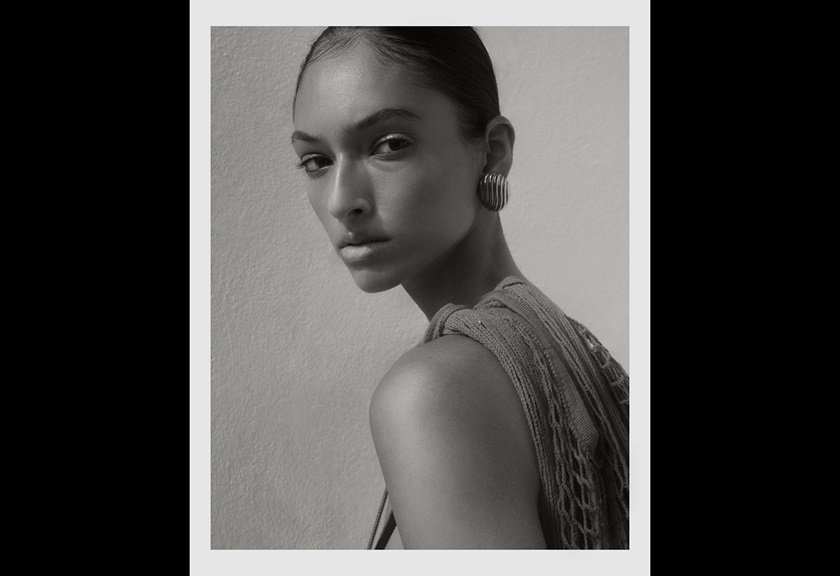 Fashion photography image of a woman with round earrings by Steph Pedersen