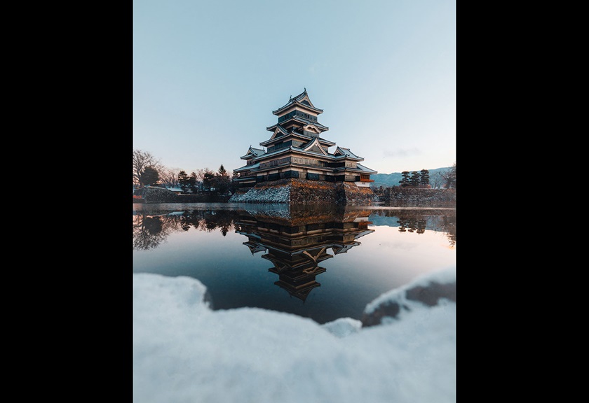 Image of an asian pagoda reflecting in the water taken by FRMEFEST 2025 creator TK North