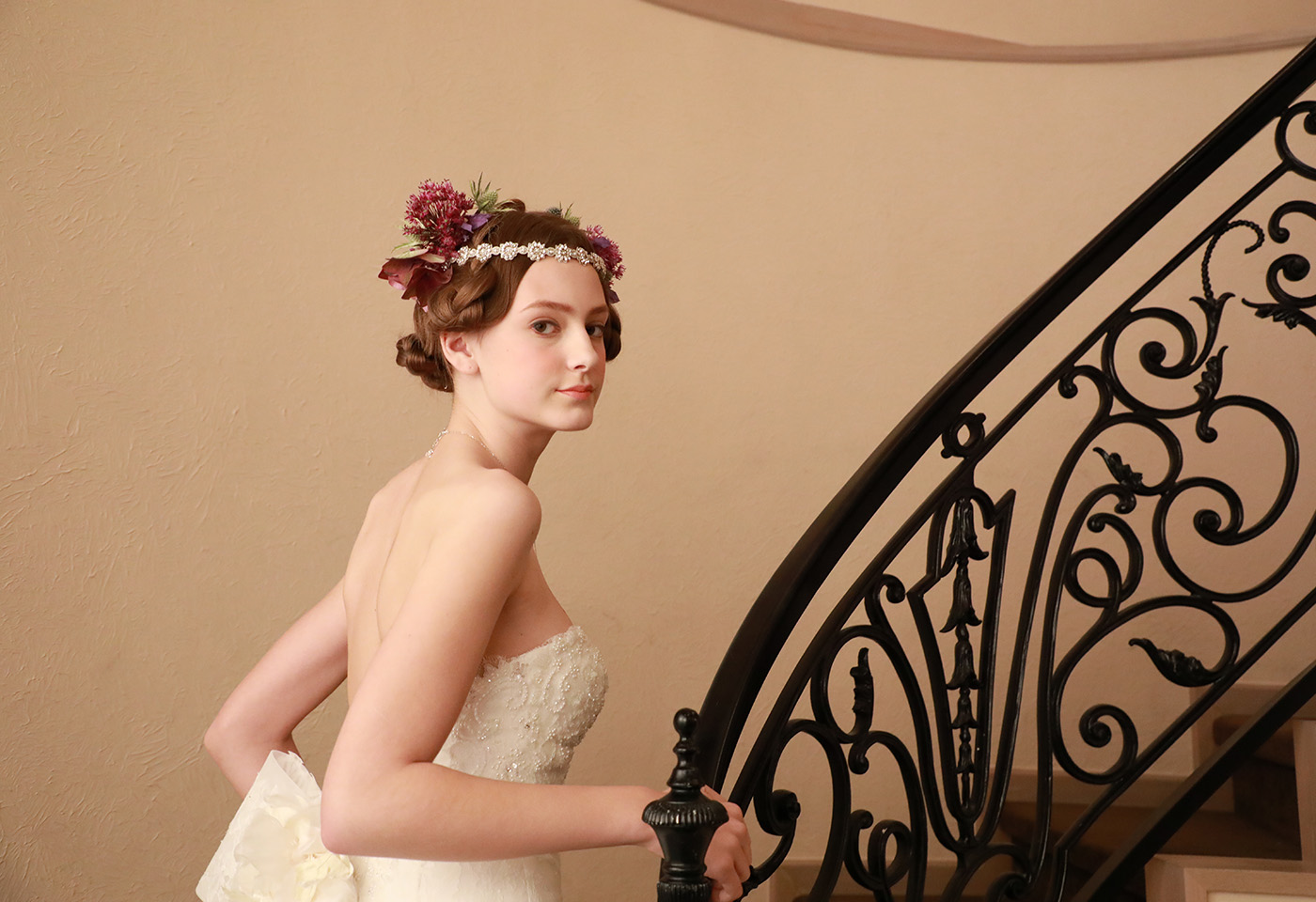 Bride walking up stairs