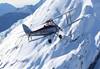 Light plane on slopes taken with Canon EF Extender 1.4x III