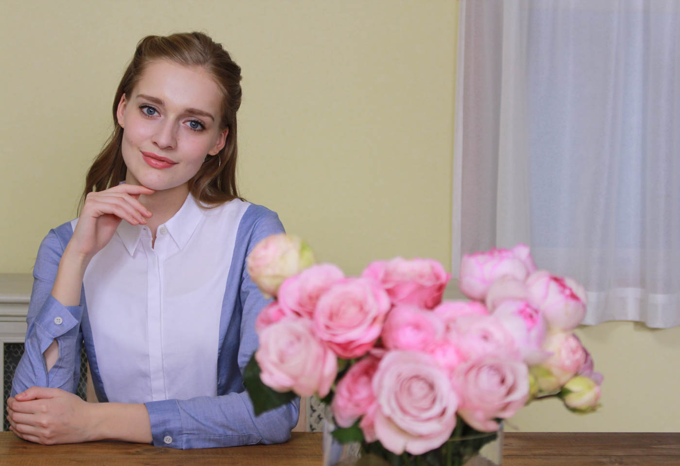 Girl with roses taken with Canon EOS 1300D DSLR camera