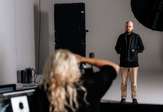 Image of photographer shooting a model