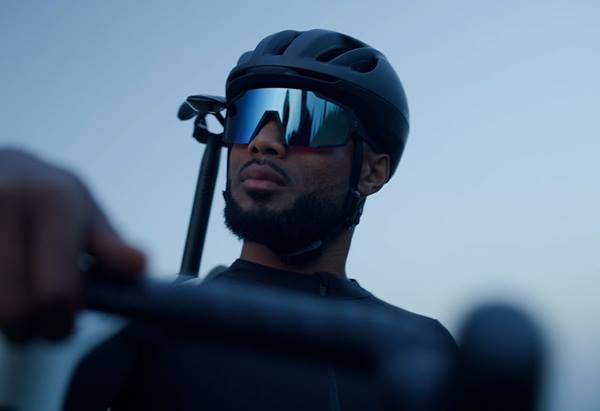 Portrait image of a person in cycling gear