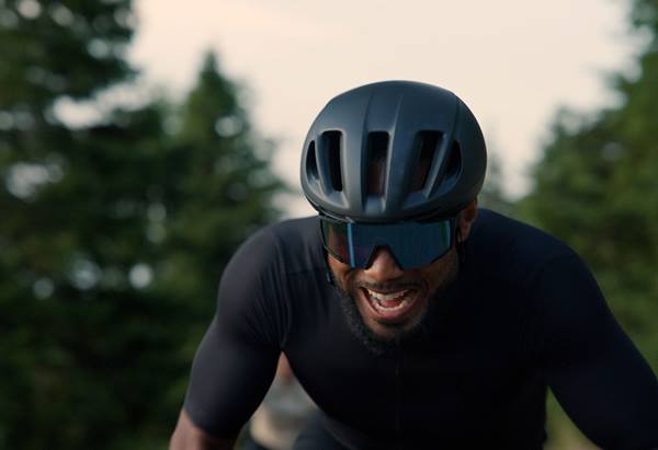 Portrait image of a person cycling