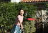 Portrait image of girl playing frisbee taken with EOS 3000D