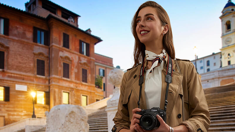 Image of woman holding EOS RP