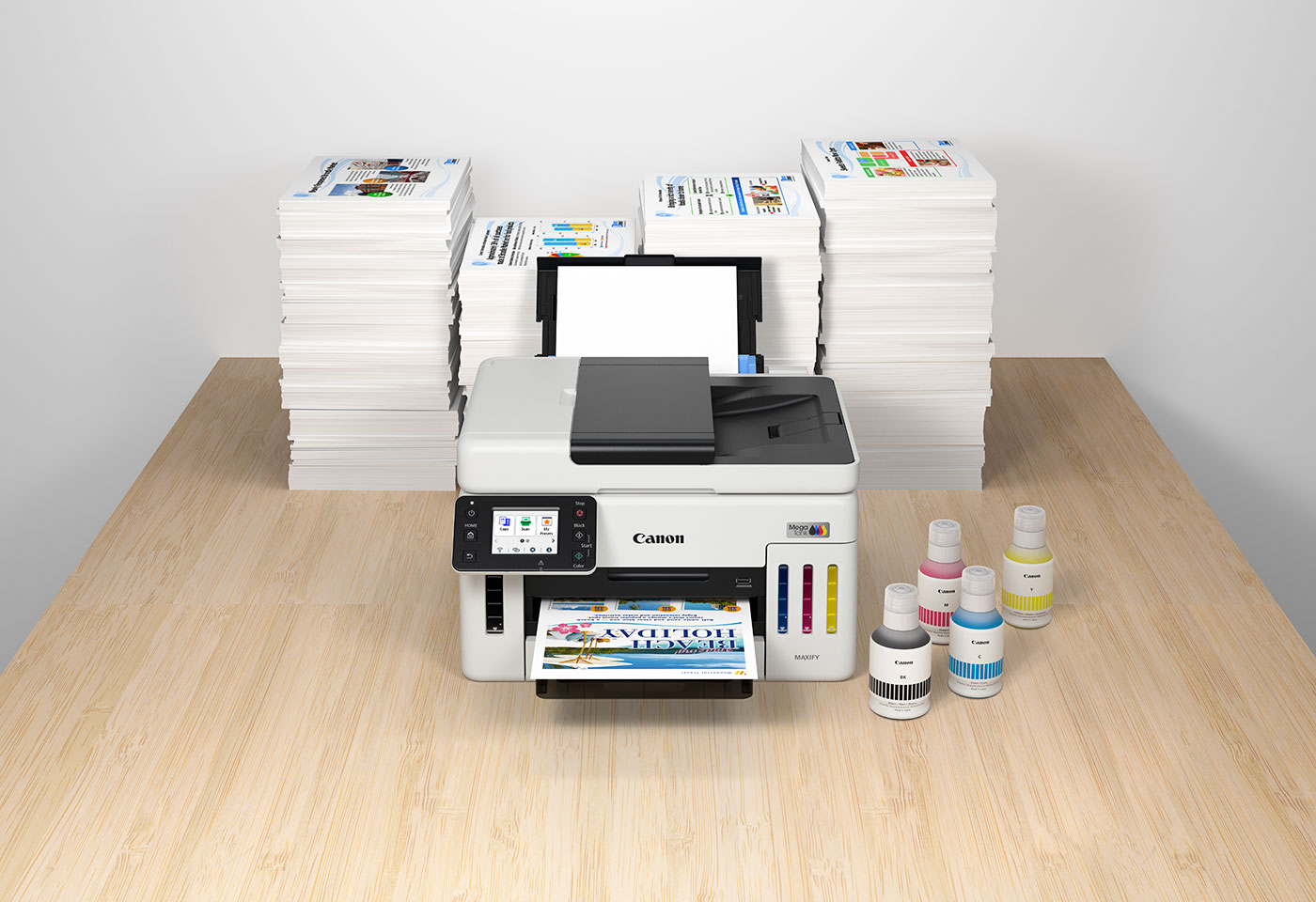 Image of MAXIFY GX6160 MegaTank home office printer, ink bottles and stacks of paper
