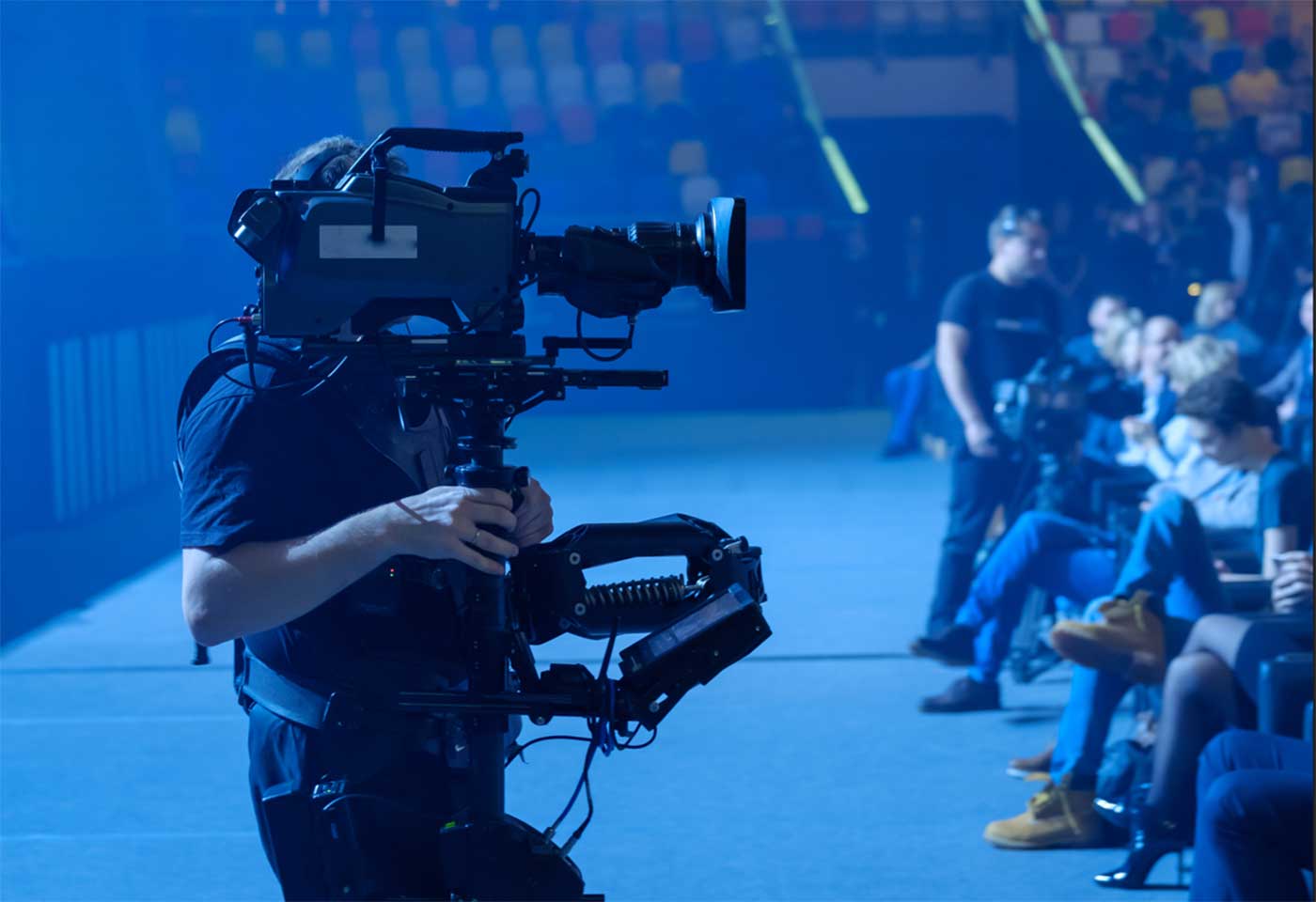 Image of a cameraman using the CJ14eX4.3B IASE S Broadcast Lens