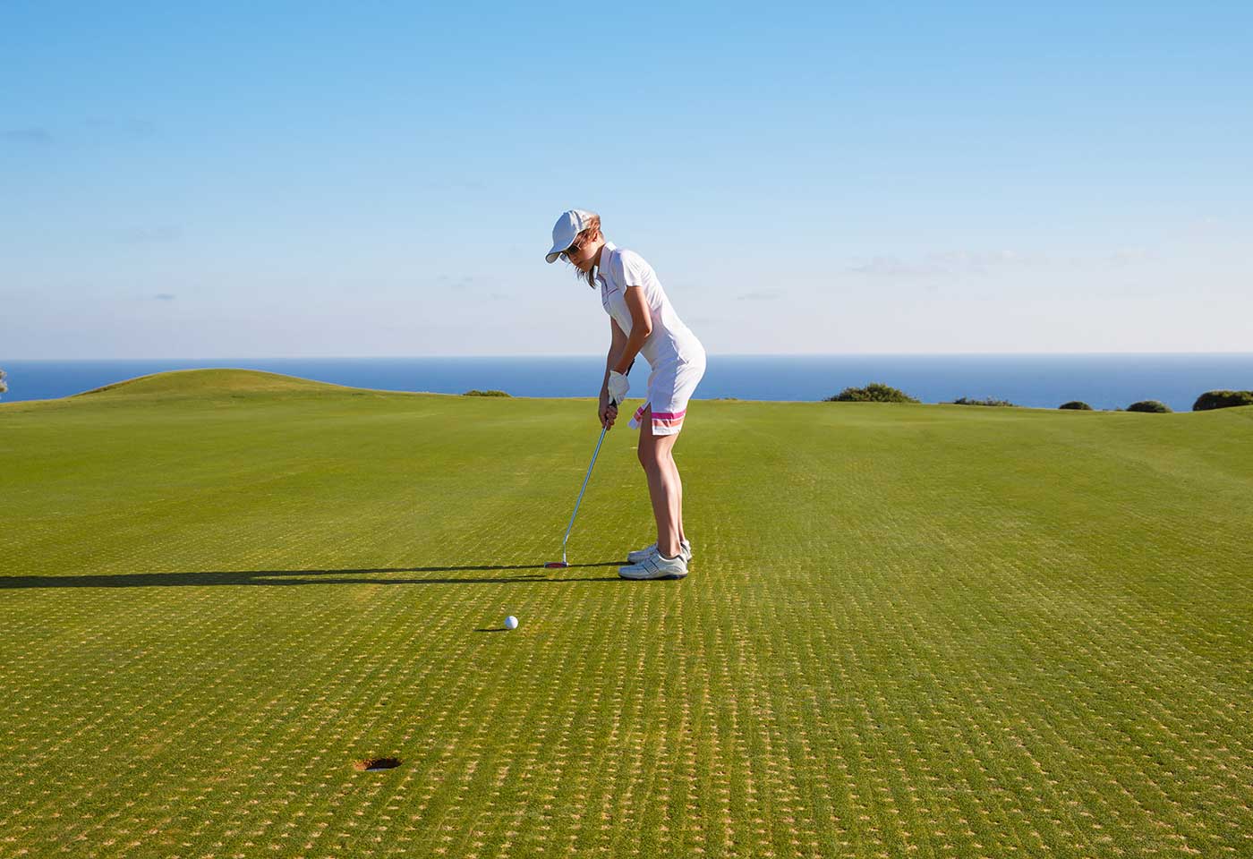 Wide angle shot of a person playing golf