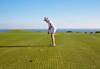 Wide angle shot of a person playing golf