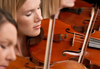Image of a violinist playing the violin taken with the CN-E 31.5-95mm T1.7 Cinema lens