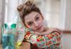Portrait image of woman shot using RF 85mm f/2 Macro IS STM macro lens