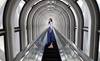 Image of model inside glass tunnel taken using the RF 28mm f/2.8 STM prime lens