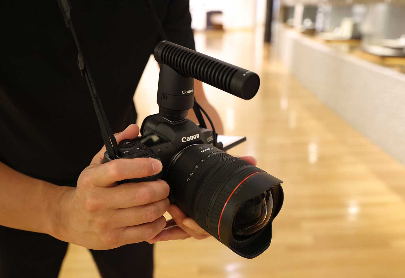 Canon EOS camera with lens and microphone