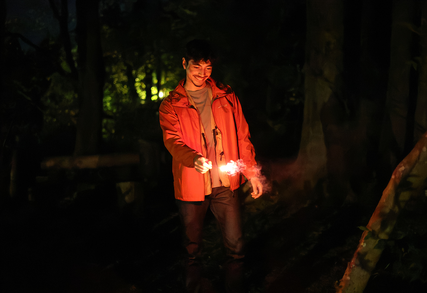 Model holding a sparkler taken using the EOS R8 mirrorless camera