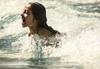 Image of of girl swimming in ocean
