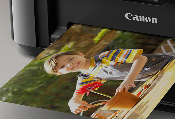Canon printer printing out a photograph