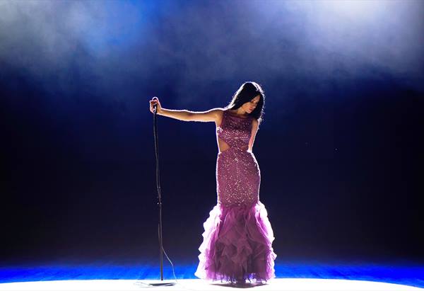 Woman performing on stage